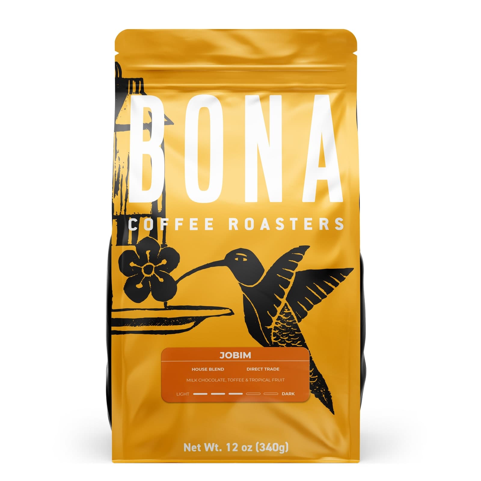 A mesma ilustração do beija-flor aplicada ao blend Jobim, com etiqueta de outra cor — a ilustração se repete, a etiqueta muda.